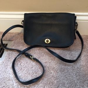 Black leather Coach cross body bag